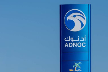 Adnoc Gas Station blue sign a petrol gas station in the Middle East clipart