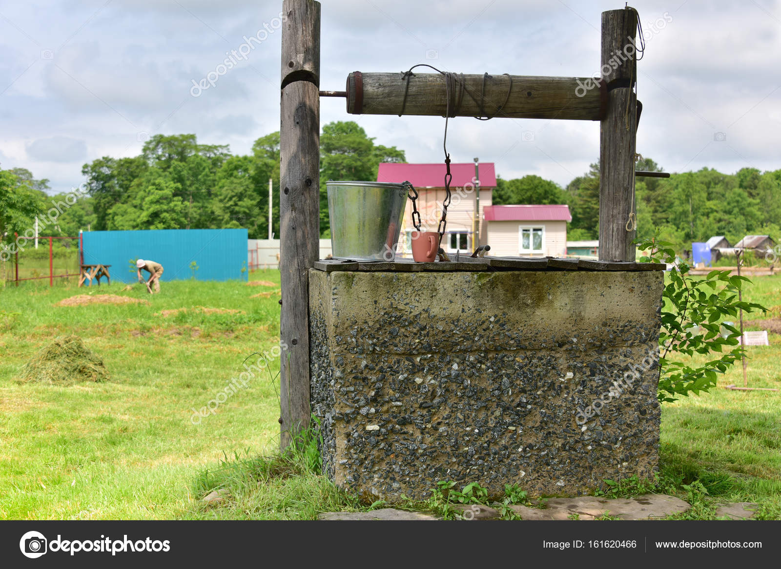 Village Life Well With Icy Crystal Clear Water Stock Photo