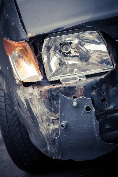 Crashed car headlight detail — Stock Photo, Image