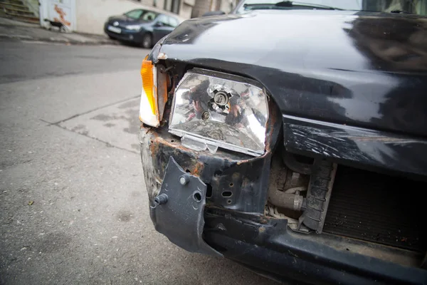 Detalle del faro del coche estrellado — Foto de Stock