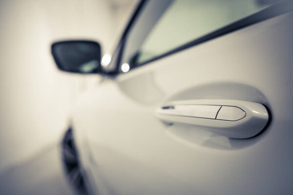 Close up shot of a car door handle.