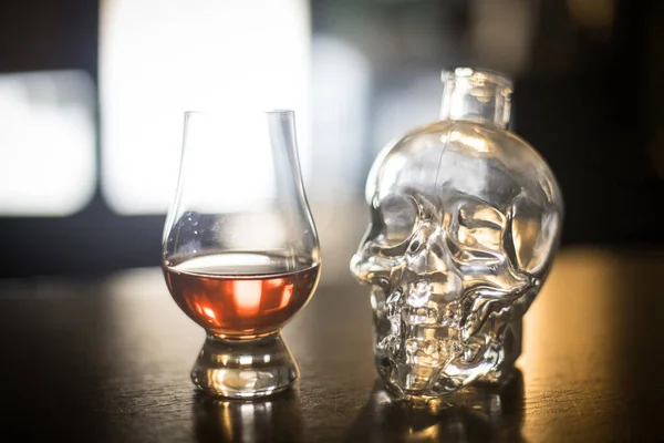 Glencairn whisky glass and skull shaped bottle