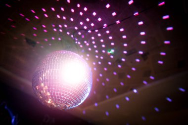 Shiny disco ball in a night club