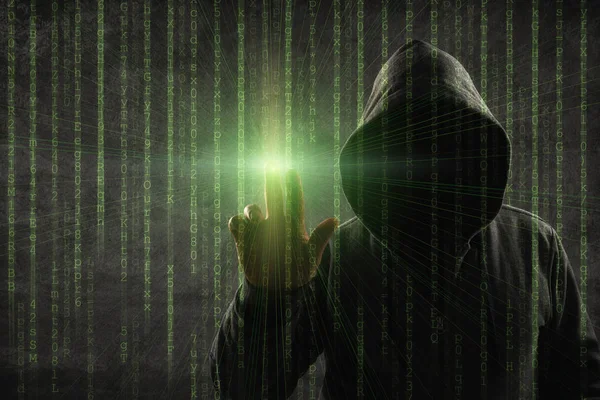 Hacker over a screen with binary code — Stock Photo, Image