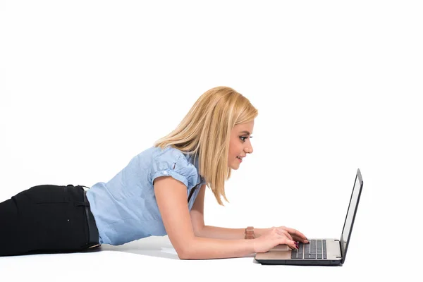 Isolated young blonde woman work on laptop. — Stock Photo, Image