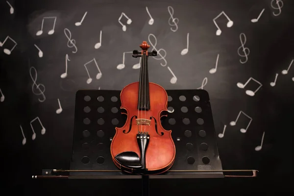 Classic old violin and notes.Music instruments background. — Stock Photo, Image