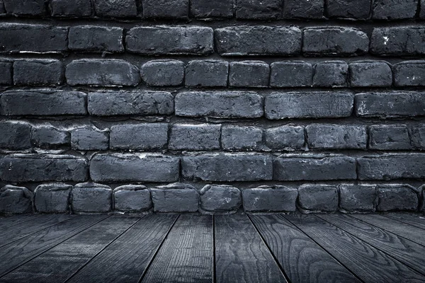 Lichte en donkergrijze bakstenen op de muur en houten vloer decoratie voor de achtergrond — Stockfoto