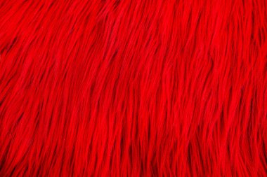 Arka plan dokusu için yün kumaşlı tüylü halı yumuşak romantik pastel kırmızı ve pofuduk. 