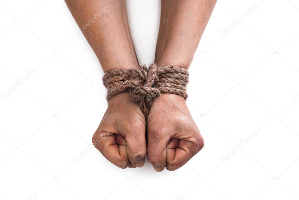 woman hands knoted by rope or string isolated on white background. Vilonce and abusement woman concept. 