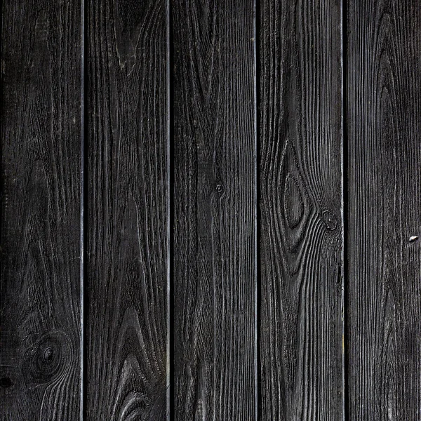 Fondo de madera oscura de tablones viejos. De cerca. —  Fotos de Stock