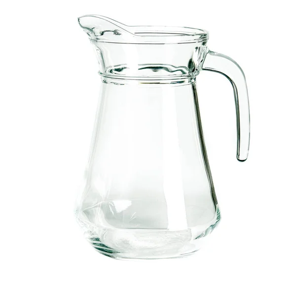 Un bicchiere di vetro vuoto e una caraffa per stand acqua su uno sfondo bianco — Foto Stock