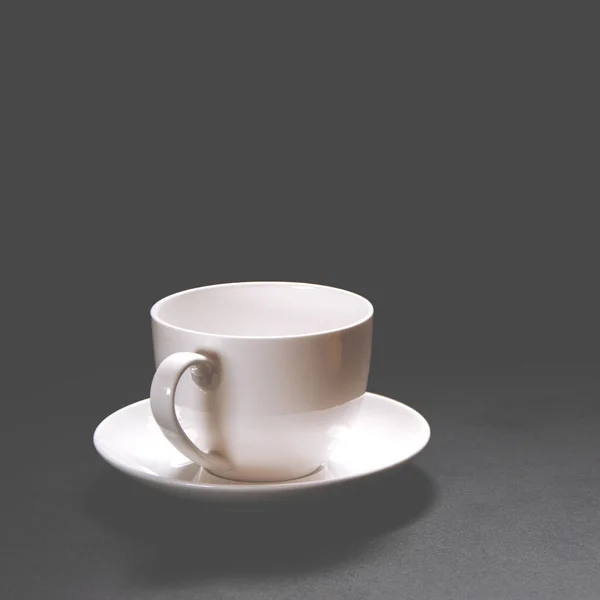 White Ceramic Coffee Cup Stands Black Background Close — Stock Photo, Image