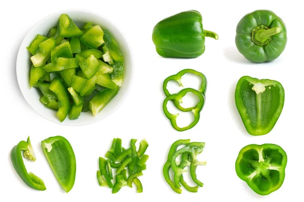Set frischer ganzer und in Scheiben geschnittener grüner Paprika isoliert auf weißem Hintergrund. Ansicht von oben — Stockfoto