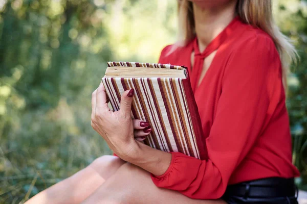 Young Woman Wearing Red Shirt Holding Striped Book Notebook Close — Stock Photo, Image