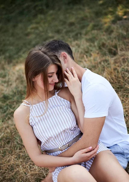 Young Couple Love Sitting Green Yellow Grass Lawn Hugging Embracing — Stock Photo, Image