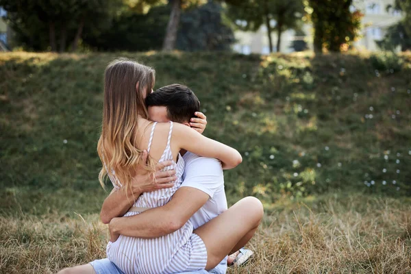 Young Couple Love Sitting Green Yellow Grass Lawn Hugging Embracing — Stock Photo, Image