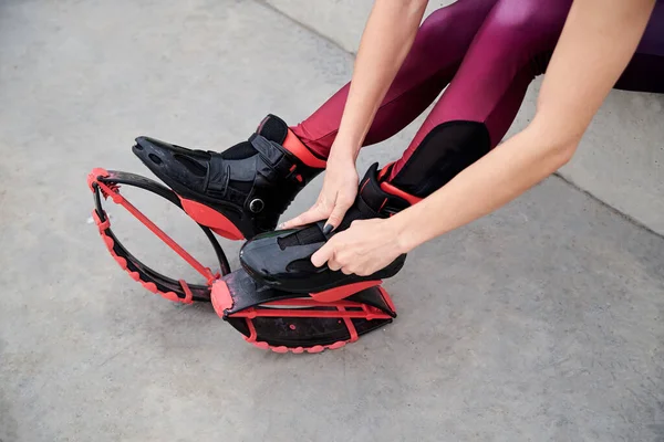 Close Picture Hands Process Buttoning Kangoo Jumps Young Woman Legs — Stock Photo, Image