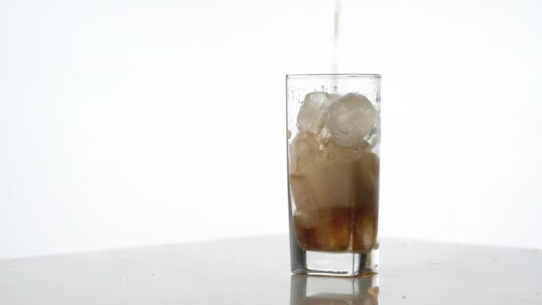 Cold Refreshing Cola Pouring Glass Ice White Background Space Text — Stock Video