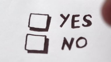 Human hand marking yes on checklist, tick placed on excellent check box. Customer service survey, satisfaction symbol