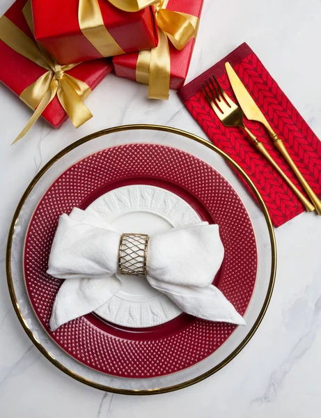 Table top holiday dinner setting with tableware and napkin