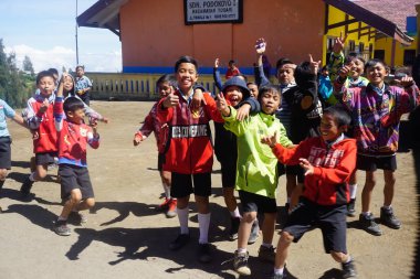 Bromo Volcano, Indonesia - March 29, 2018: Joyful Indonesian Village Children