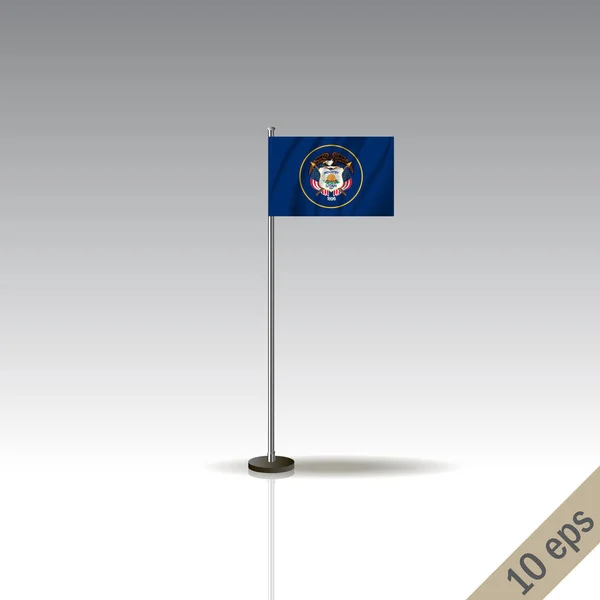 ユタ州の旗テンプレート ユタ州の旗を金属製の棒で振って 灰色の背景に隔離された — ストック写真