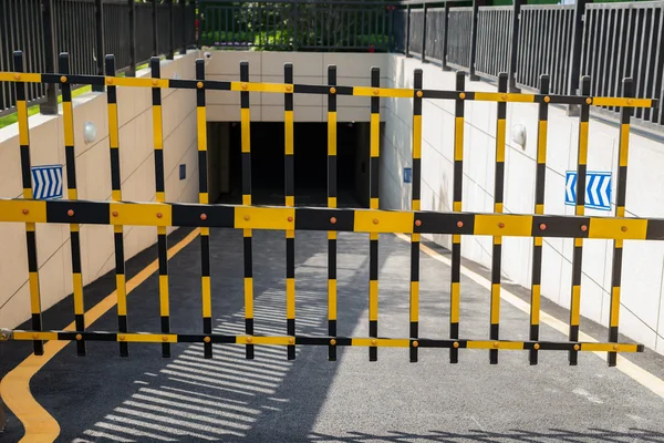 Vehicle security barrier closed - entrance to an underground car park — Stock Photo, Image