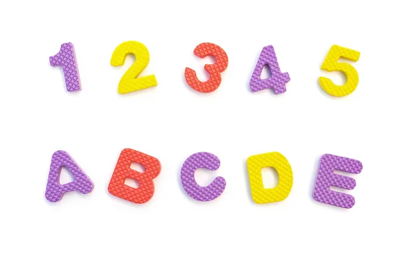 Bokstäver av 12345 och Abcde gjort av alfabetet pussel på vit — Stockfoto