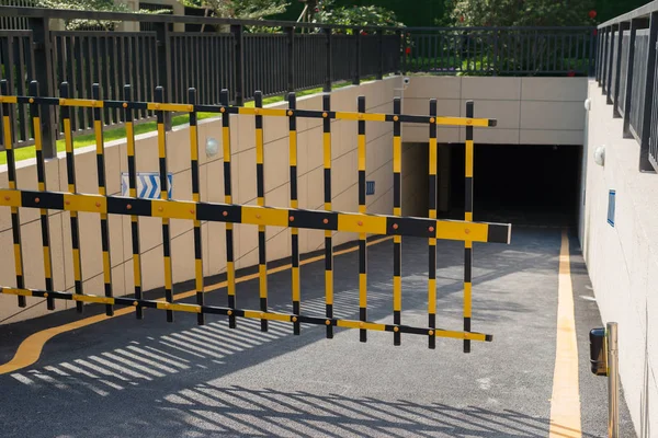 Vehicle security barrier closed - entrance to an underground car park — Stock Photo, Image