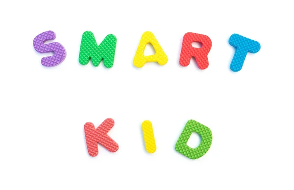 Wyraz inteligentne dziecko kształtowane przez Puzzle alfabet biały — Zdjęcie stockowe