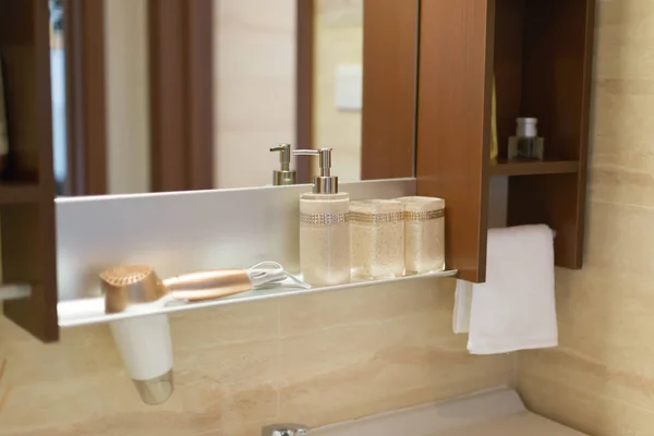 Mirror and shelf in a bathroom — Stock Photo, Image