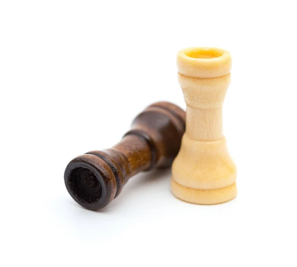 White Rook stands up and brown one lays down on white — Stock Photo, Image