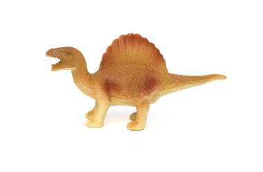 yan görünümü kahverengi spinosaurus oyuncak beyaz bir arka plan üzerinde