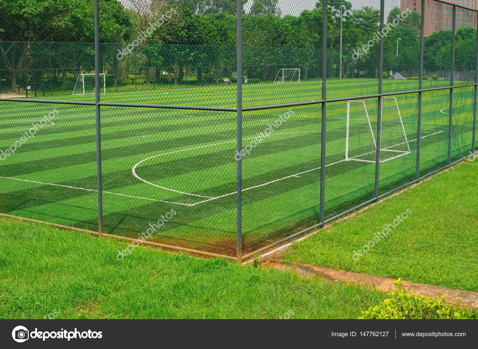 A soccer field behind the fence — Stock Photo © FreerLaw 147762127