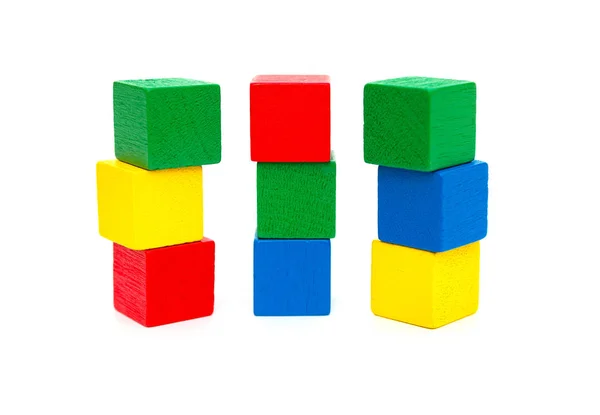 Colorful wooden toy blocks on a white background — Stock Photo, Image