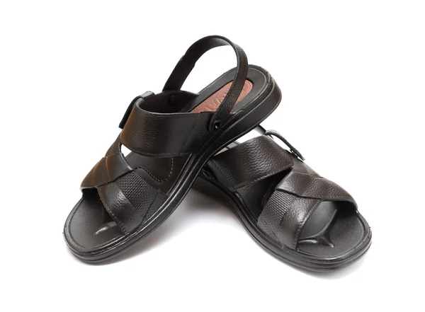 Paar schwarze Freizeit-Sandalen auf weißem Hintergrund — Stockfoto