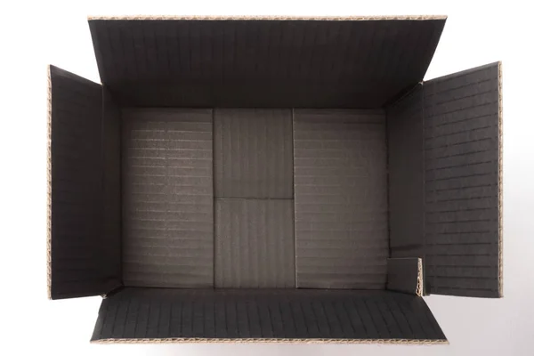 Empty black corrugated carton inside — Stock Photo, Image