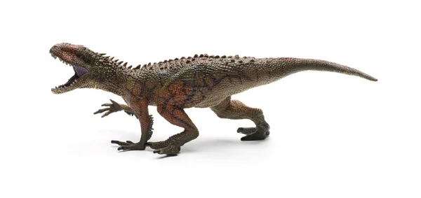 Oldalnézet Carcharodontosaurus játék, fehér alapon — Stock Fotó