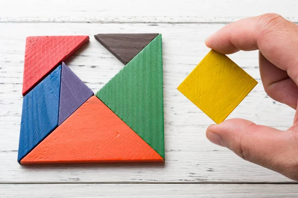 Wykańczania ostatnio trochę drewniany tangram — Zdjęcie stockowe