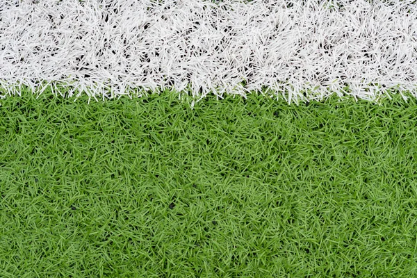 Erba e linea di confine sul campo di calcio come sfondo — Foto Stock