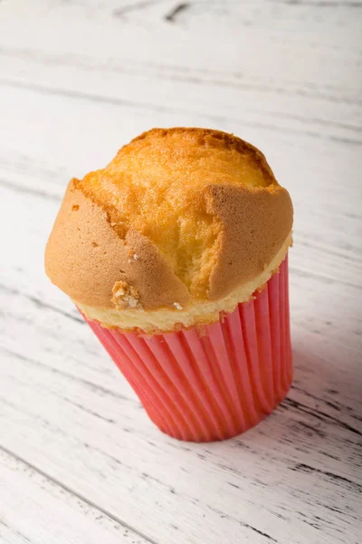 Homemade cup cake on a wood background — Stock Photo, Image