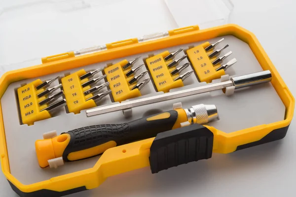 Interchangeable screwdriver set with different types of metal steel heads and bits — Stock Photo, Image