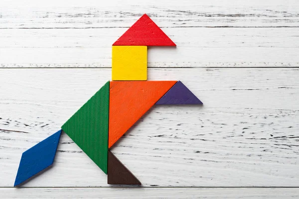 Wooden tangram in a horse shape — Stock Photo, Image