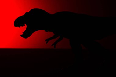 Tyrannosaurus gölge koyu kırmızı ışık ile