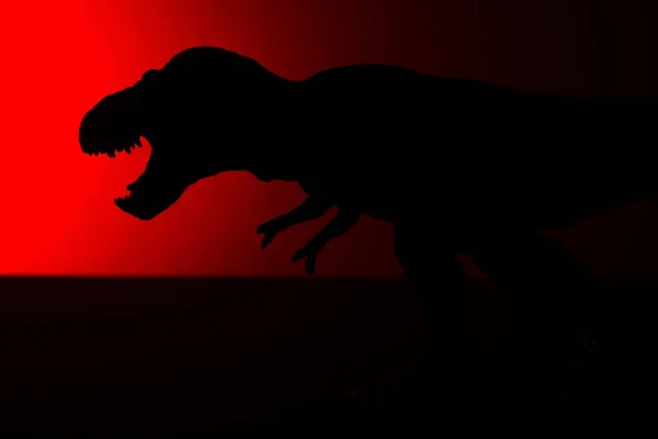 Tyrannosaurus Shadow Red Light Dark — Stock Photo, Image