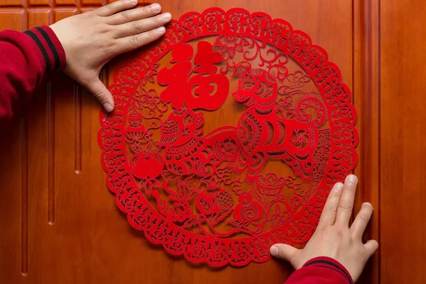 Man Sticking Chinese New Year Dog 2018 Door Chinese Means — Stock Photo, Image