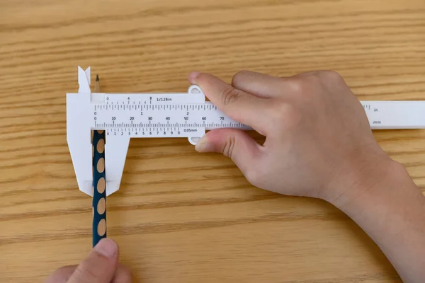 Kid Using Caliper Measure Diameter Pencil — Stock Photo, Image