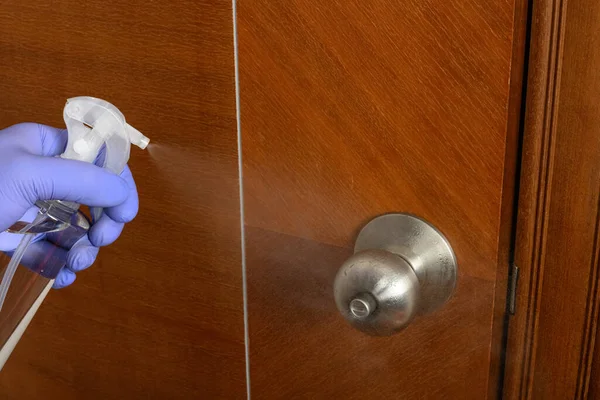 Spraying Disinfectant Alcohol Door Lock — Stock Photo, Image