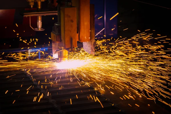 Metal sparks. Industrial laser and plasma cutting of sheet steel
