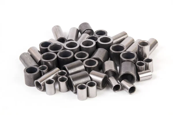 Metall cylindrar på vit bakgrund. Mekanik och teknik teknik. — Stockfoto